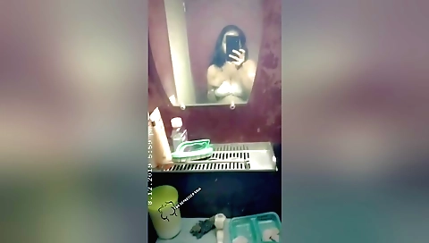 Solo amateur video showing a hot brunette on camera