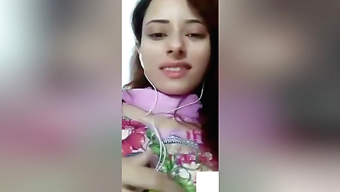 Sexy brunette in red top shows her nice body on webcam