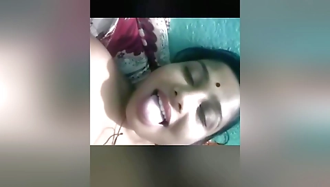 Hot amateur indian video shows brunette masturbating