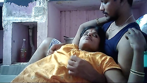 Indian housewife in the kitchen seduces her boyfriend