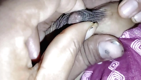 Indian babe with a nice ass gets horny in the bedroom