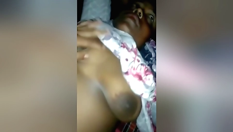 Chubby brunette girl makes out with her boyfriend in bedroom