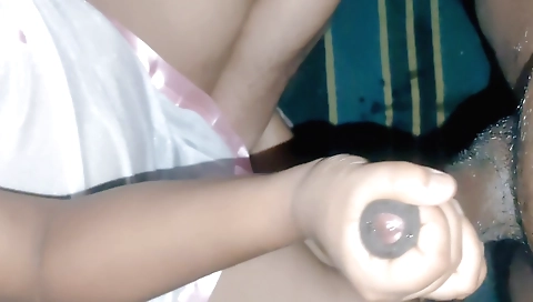 Indian girl with big breasts in a dress giving handjob