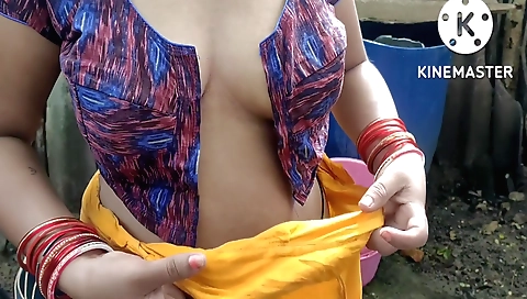 Indian housewife takes a hot shower in the shower room