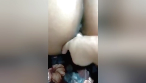 Busty babe is playing with her wet pussy in this vid