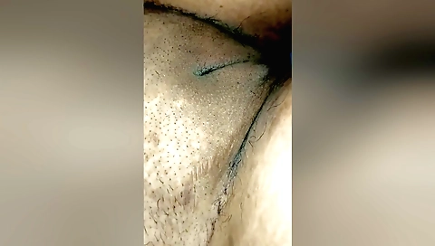 Indian teen is cleaning her bra and hair on the camera