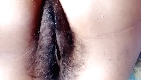 Indian woman has a hairy pussy in a solo amateur video