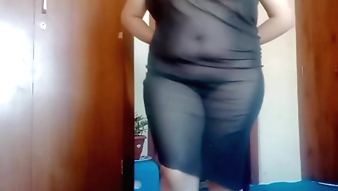 Big ass brunette in a sexy blouse and black stockings