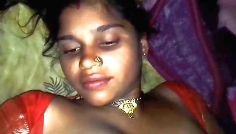 Indian brunette is fucking on the bed in her bikini
