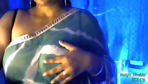 Indian chick rubs her tits and gives a good blowjob