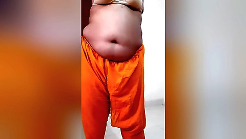 Horny solo amateur female showing off her small tits and curves