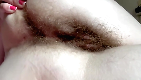 Hairy amateur brunette gives a good blowjob and a blowjob