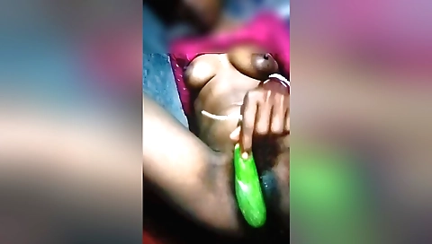 Indian woman in lingerie masturbates with her favorite fruit