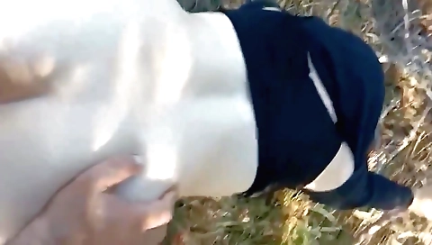 A girl rides her stepbrother in a hot outdoor sex clip