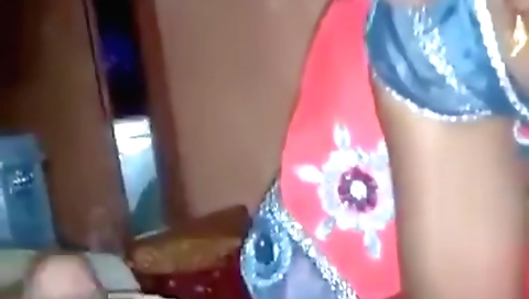 Girl gets a blowjob in the porn scene with some other people