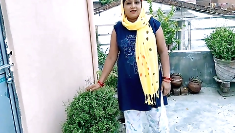 Girl with an attractive face is on the web cam in an outdoor video