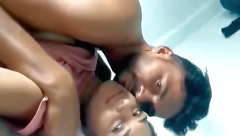 Indian brunette girl plays in the village outdoors