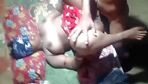 Indian woman is giving a handjob to his shaved penis