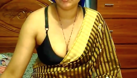 Indian girl with a sexy blonde hair in red dress and white blouse