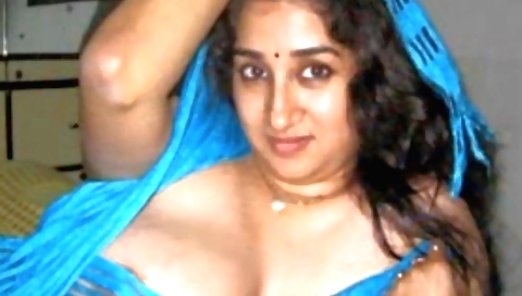 Busty chick in her indian clothes makes a solo clip