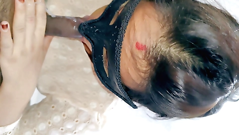 Indian brunette with a big ass sucking in a bedroom
