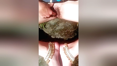 Gorgeous amateur woman masturbating in spring fountain