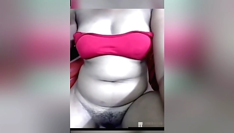 Hairy brunette in a sexy dress and white dress solo porn clip