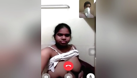 Sexy brunette shows her big boobs in an erotic way