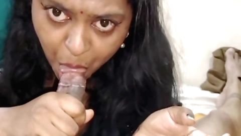 Indian brunette with a shaved pussy fucks in the kitchen