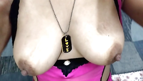 Busty brunette gets herself in a hot position and masturbates