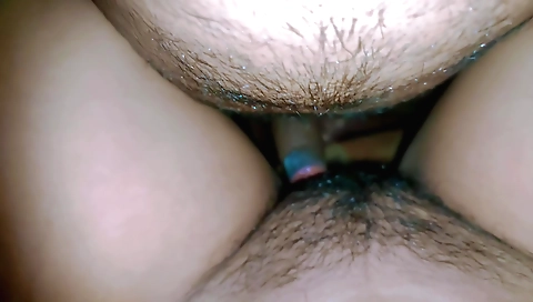 Indian babe with a hairy cunt gets on the bed and is fucked