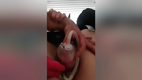 Busty brunette gets wet pussy with a huge pump in her cunt