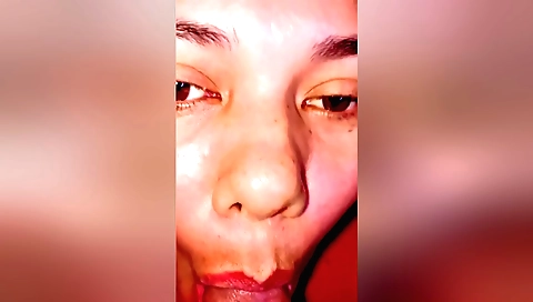 Cute girl with a sexy face sucks and gets a facial